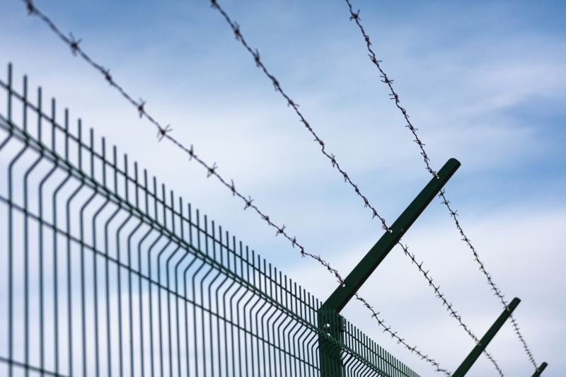 Barb Wire Fence Installation